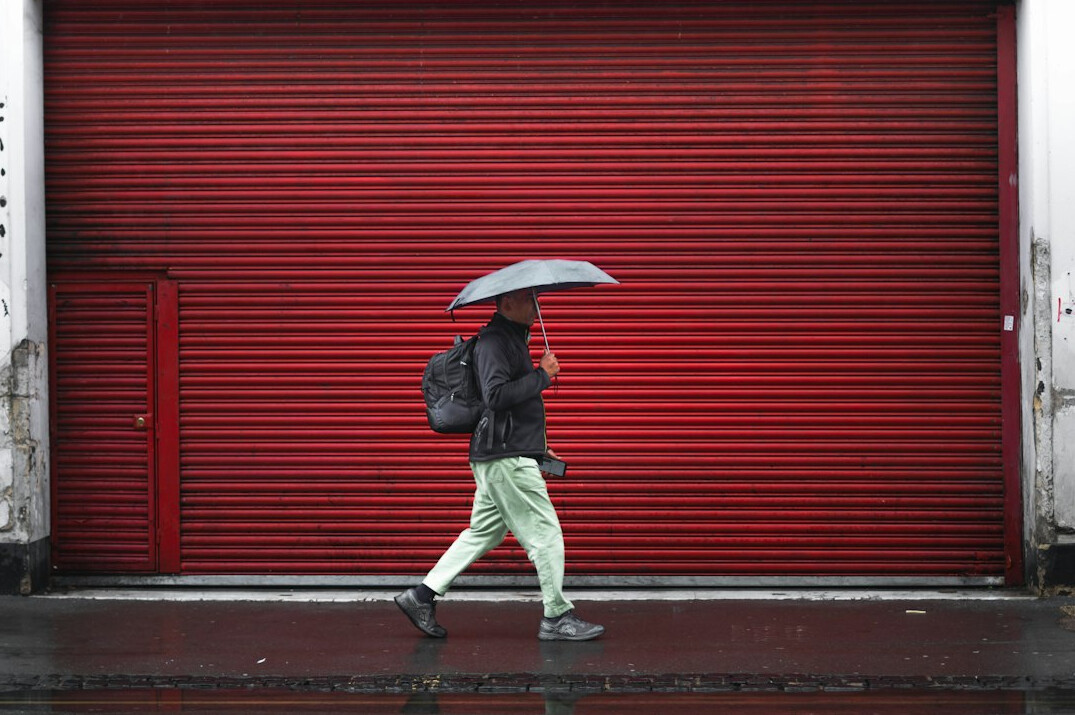 person walking in rain